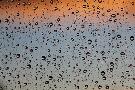 water droplets on clear glass panel thumbnail