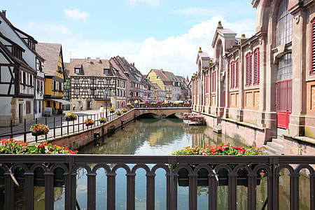 brown concrete village beside river at daytime thumbnail