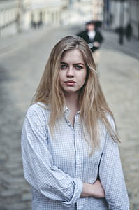 Woman Wearing White Dress Shirt Shallow Focus Photography thumbnail
