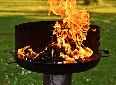 timelapse photography of wood burner with charcoal on fire at daytime thumbnail