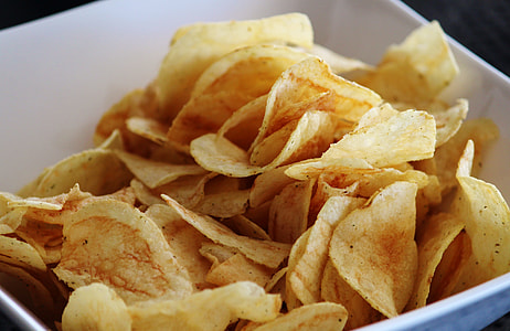 potato chips in white ceramic bowl thumbnail
