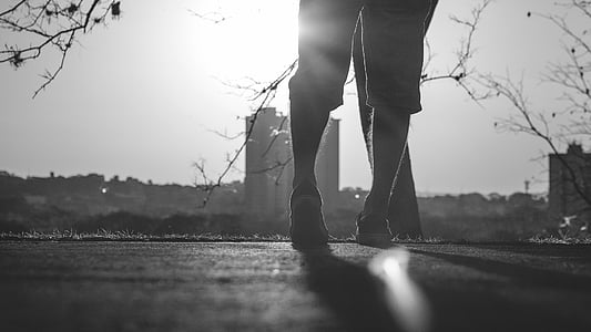 person walking on road thumbnail