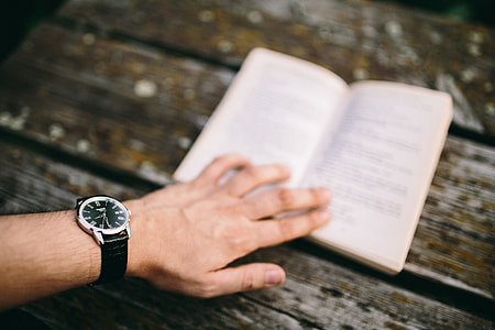 Reading book at lake thumbnail