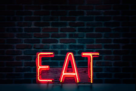 EAT neon light signage turned on thumbnail