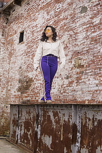 woman standing on gray steel frame thumbnail