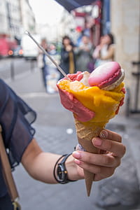 person holding ice scream cone thumbnail