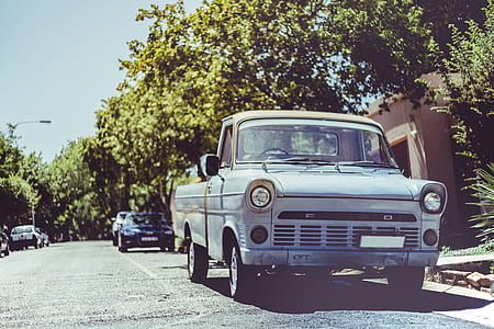Ford single cab truck beside street thumbnail
