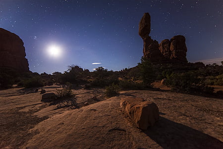 landscape photography of boulder at night thumbnail