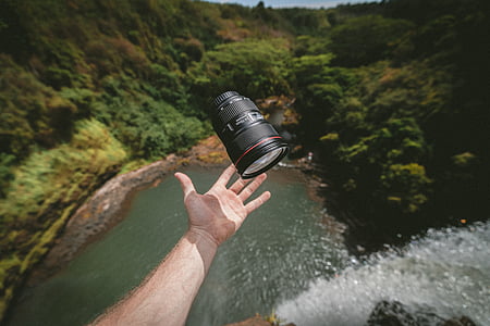 person catching camera lens thumbnail