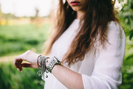 Silver watch on the girl's arm thumbnail