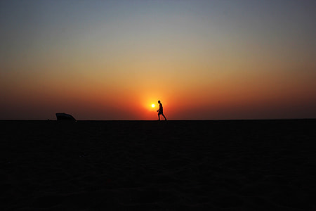 silhouette photo of a person walk thumbnail