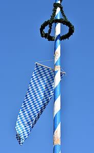 blue and white pennant flag hanging on pole thumbnail