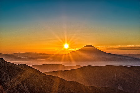 mountains during sunrise photo thumbnail