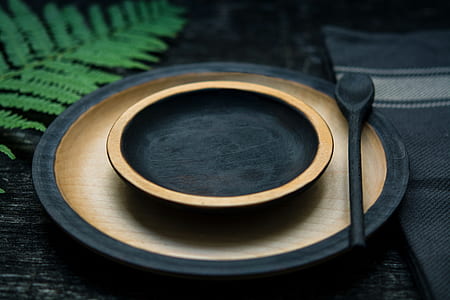 black and brown saucer and plate on table thumbnail