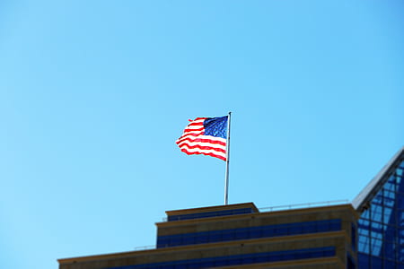 flag of U.S.A above building thumbnail