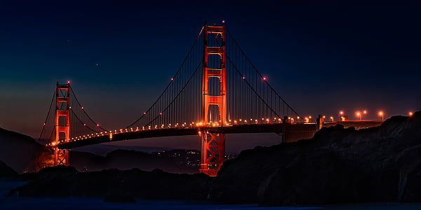 red and black bridge during daytime thumbnail