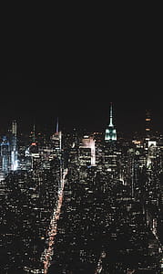 Bird's-eye View Photography of High Rise Building during Night Time thumbnail