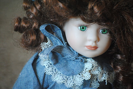 brown-haired doll wearing blue dress thumbnail