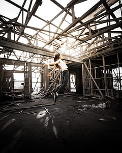 woman jumping inside abandoned place thumbnail