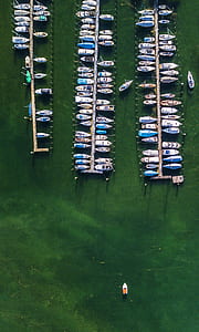 aerial photo of assorted-color yachts beside docks thumbnail