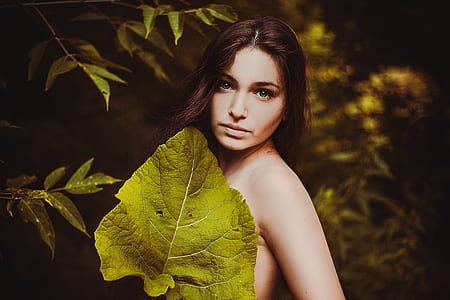 woman beside green leaf thumbnail