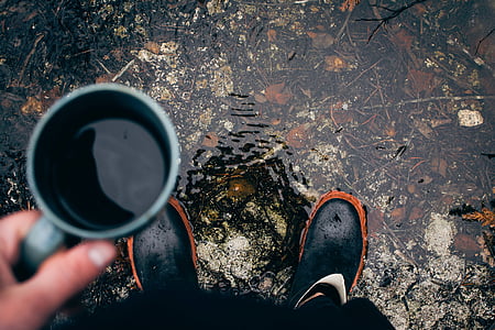 person holding blue ceramic mug thumbnail