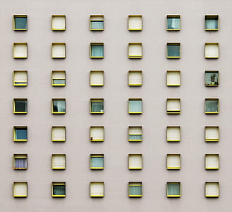 assorted windows on gray wall thumbnail