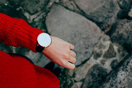 person in knit sweater wearing watch thumbnail