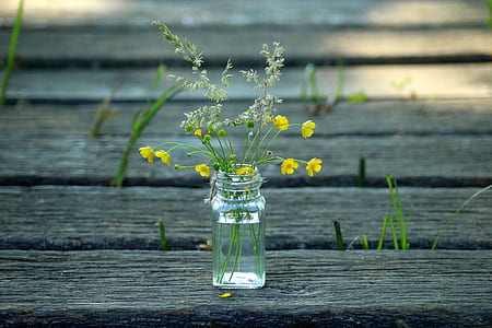 yellow and white flowers in vase thumbnail