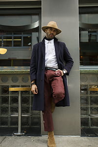 man leaning on post thumbnail