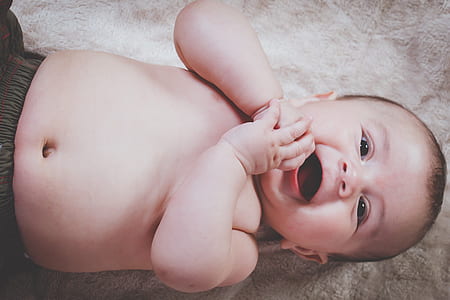 shallow focus photography of topless baby thumbnail