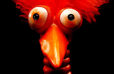 red metal bird figure thumbnail
