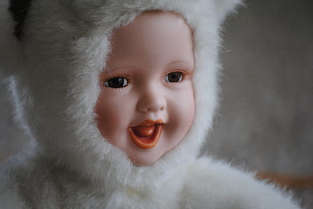 baby doll in white animal costume thumbnail