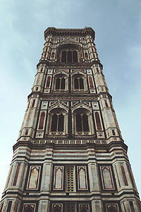 low angle photography of brown concrete building thumbnail