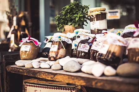 jars on brown wooden table thumbnail
