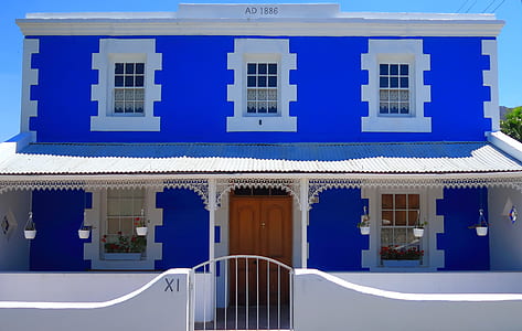 white and blue concrete 2-storey house thumbnail