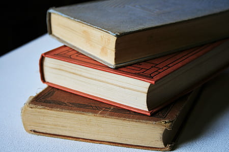 closeup photo of stack of books thumbnail