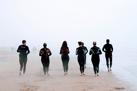 people walking on beach thumbnail