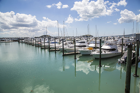 white yacht lot during daytime thumbnail