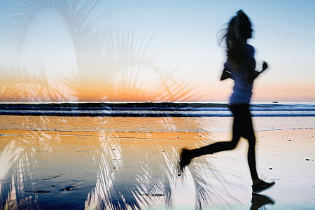 woman running on sea shore thumbnail