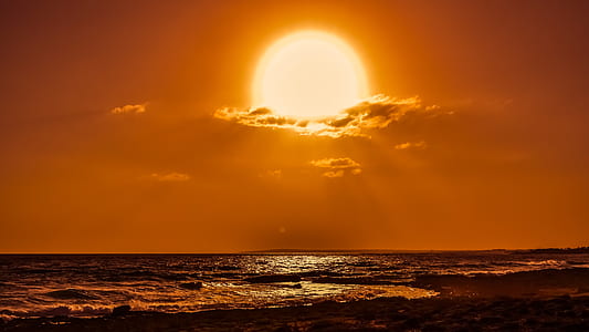 sun above ocean thumbnail