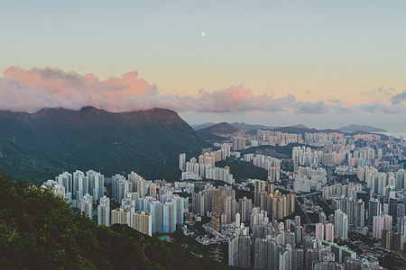 aerial photography of city near mountain thumbnail