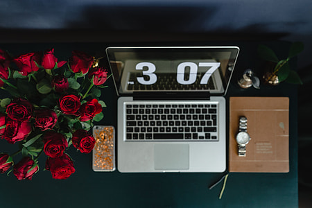 Office Desk Table With Red Roses thumbnail