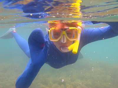 woman snorkeling on sea thumbnail