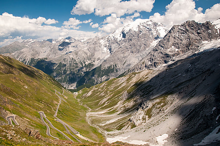 gray and green mountains under clear sky thumbnail
