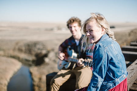 woman in blue denim jacket singing thumbnail