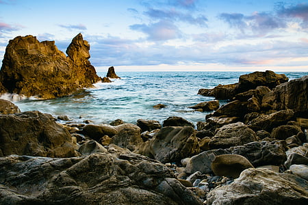 brown rock formation under blue sky thumbnail