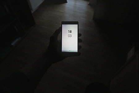 person holding black Android smartphone thumbnail