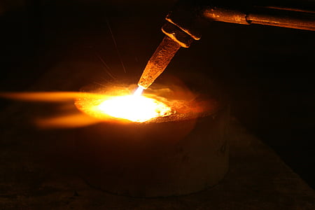 cutting torch against black background thumbnail