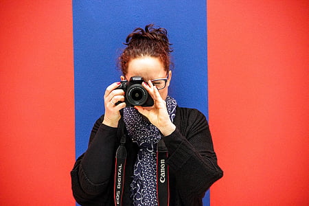 woman using camera thumbnail